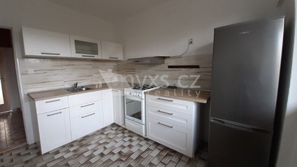 Pronájem bytu 3+1 se zahradou a garážovým stáním - Fotka 1